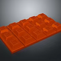 Delicious Orange Chocolate Bar With Square Blocks And Patterned Surface