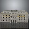 Symmetrical Multi Story Classical Building With White Exterior Yellow Accents Arched Doors And Windows