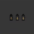 Three Traditional Metal Lanterns With Grid Panels And Lit Candle On Gray Platform