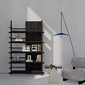 Modern Dark Wood Bookcase With Layered Shelves Accent Chair And Floor Lamp