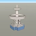 Two Tier Decorative Fountain Design With Blue Base And Ornate Carvings
