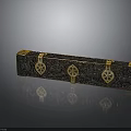 Black And Gold Decorative Box With Intricate Carvings And Golden Clasps