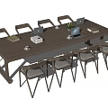 Wooden Conference Table With Laptops Notebooks Coffee Cups And Surrounding Chairs