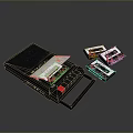 Vintage Blue Computer Tape Drive With Open Transparent Cover And Black Red Labeled Cassettes