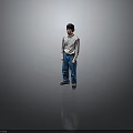 Man in Light Long Sleeve Shirt and Blue Jeans Standing with Headphones Against Gray Background
