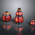 Carved Glass Vases in Red and Orange Patterns with Various Sizes on Black Background