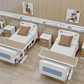 Medical Equipment in Modern Hospital Room Featuring Two Adjustable Beds Bedside Cabinets and Mobile Trolley