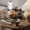 Decorative Ornaments Set With Wooden Containers Glass Bottles Metal Pieces And Table Lamp On Wooden Table