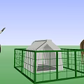 Reptile In Outdoor Space With Green Fenced White Shelter Under Blue Sky And Clouds