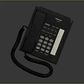Elegant Panasonic Corded Telephone Featuring Keypad Handset And Coiled Cord