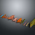 Colorful Reptile Models of Various Species Arranged in Row on Gray Background