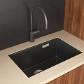 Modern Black Kitchen Sink with Sleek Faucet on Light Countertop and Wooden Cabinets