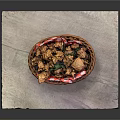 Crispy Fried Chicken in Wicker Basket with Red White Checkered Paper and Fresh Herbs