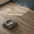 Natural Hardwood Flooring with Sunlight Leaf Shadow and Gray Cushion on Floor