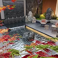 Serene Garden Courtyard With Trees Rocks Green Plants Outdoor Sofas Coffee Table And Water Feature
