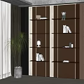 Modern Glass and Metal Shelf Unit with Books Ornaments and Indoor Plant in Room