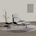 Modern Comfortable Lounge Chair With Ottoman Floor Lamp Side Table Plant And Rug