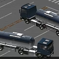 Two Blue Cab Silver Tanker Trucks In Parking Lot With White Lines