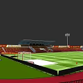 Modern Football Stadium Architecture With Red Seats Green Turf Roof Structure And Lighting Towers