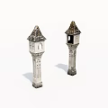 Pair of Decorative Stone Towers With Carved Details And Pointed Roofs