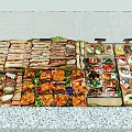 Display Shelf Featuring Fresh Assorted Sandwiches And Various Dishes Neatly Arranged
