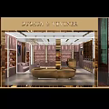 Luxury Boutique Store Interior With Glass Display Cases Gold Accents Sofa Seating And Shelves