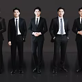 Five Men In Black Business Suits With White Shirts And Ties Standing Together