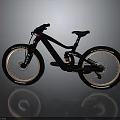 Black Mountain Bike With Large Tires And Modern Suspension Frame Design