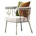 Elegant White Armchair With Gold Metal Frame And Green Brown Decorative Pillows