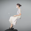 Woman Sitting And Using Laptop Wearing Patterned Dress Mask With Black High Heels