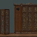 Two Vintage Wooden Wardrobes With Intricate Carved Designs And Gold Accents