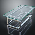 Sleek Modern Coffee Table With Clear Glass Top And Silver Metal Frame Design