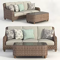 Wicker Outdoor Sofa with Patterned Cushions and Glass Top Coffee Table