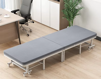 Gray Folding Bed With Wheels In Office Area Near Desk Chair And Plant 3d model