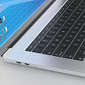 Silver Modern Laptop with Windows Desktop Interface and Multiple Application Icons
