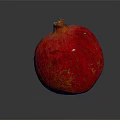 Ripe Juicy Red Pomegranate on Dark Reflective Surface with Glossy Skin
