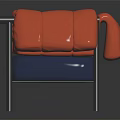 Stylish Single Sofa With Orange Puffy Backrest And Blue Cushion On Black Metal Frame