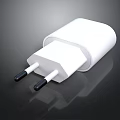 White Laptop Charger With Dual Pin Design And Black Background Reflection