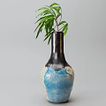 Three Decorative Vases with Green Plants Blue Green Textured Brown Ceramic and Black White Spotted