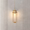 Golden Modern Chandelier With Metal Frame And Glass Shade Hanging On Gray Wall