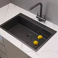 Modern Kitchen Faucet on Marble Countertop with Black Sink Metal Rack and Yellow Lemons