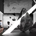 Large Contemporary Stone Sculpture In Art Gallery With White Light Beam And Broken Fragments