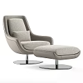 Modern Curved Leisure Chair Upholstered In Light Gray Fabric With Matching Ottoman