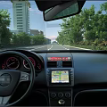 Car Interior With Steering Wheel Dashboard Navigation Screen And Road View Through Windshield