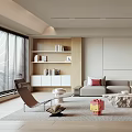 Modern Living Room Interior With Beige Sofa Red Cushions Stone Coffee Table And Bookshelf Rug