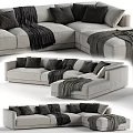 Modern Light Gray Sectional Sofa With Black Pillows And Cozy Throw Blankets
