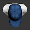 Blue Baseball Cap With Brown Logo Displayed On White Mannequin Head