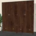 Dark Brown Wooden Wardrobe with Carved Patterns Four Doors Drawers and Indoor Potted Plant