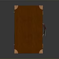 Brown Leather Suitcase With Metal Hardware And Red Luggage Tag