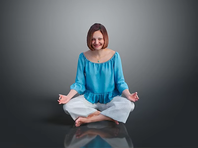 Woman Sitting Cross Legged Meditating in Blue Top Light Pants on Reflective Gray Floor 3d model